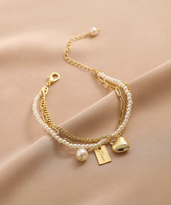 Gold Metal Alloy Pearl Graphic Love Tassel Charm Bracelet